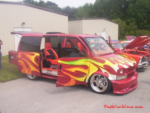 Lowriders that have been lowered, dropped, slammed, and scraping.