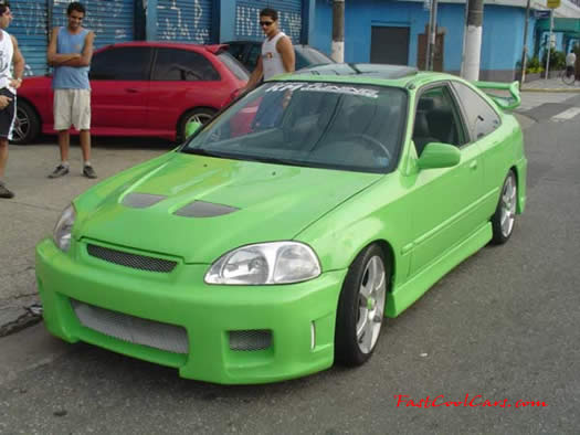 Lowriders that have been lowered, dropped, slammed, and scraping, using many different modifications. lime green paint