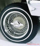 Lowriders that have been lowered, dropped, slammed, and scraping,  Wire wheels.