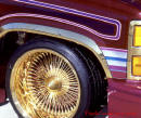 Lowriders that have been lowered, dropped, slammed, and scraping, Wire Rims.