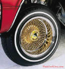 Lowriders that have been lowered, dropped, slammed, and scraping, Wire wheels.
