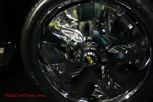 Lowriders that have been lowered, dropped, slammed, and scraping, Custom Rims.