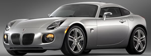 2009 Pontiac Solstice GXP Coupe - The coupes roof is fixed aft of the B-pillars, with side windows and a rear lift glass for access to the cargo area. 