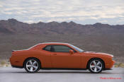 New Dodge Challenger, 6.1 V8 Hemi, 425 crank horsepower, 420 crank foot pounds of torque. SRT8, looks great from the side.