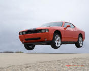 New Dodge Challenger, 6.1 V8 Hemi, 425 crank horsepower, 420 crank foot pounds of torque. SRT8, getting some air.