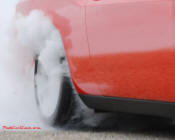 New Dodge Challenger, 6.1 V8 Hemi, 425 crank horsepower, 420 crank foot pounds of torque. SRT8, roasting the tires.