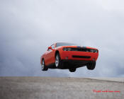 New Dodge Challenger, 6.1 V8 Hemi, 425 crank horsepower, 420 crank foot pounds of torque. SRT8, jumping like the dukes of Hazzard.