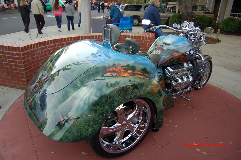 Pimped out ride, Pimp my ride with custom air brushed paint job, said to be about $25,000. for paint alone, with a 502 big block Chevrolet engine, one Pimped out trike, with huge chrome bling wheels, nice rims.