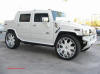 Pimped out ride, Pimp my ride with custom white paint, and huge custom white and chrome wheels, one nice Hummer.