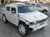 Pimped out ride, Pimp my ride with custom white paint, and huge custom white and chrome wheels, one nice Hummer.