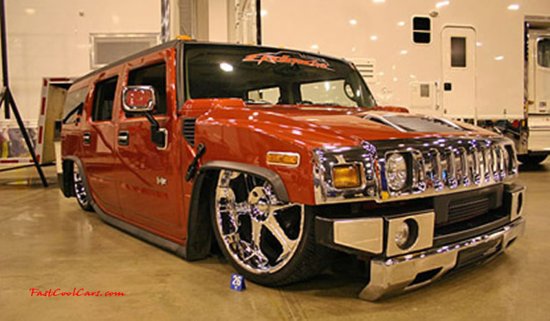 Pimped out ride, Pimp my ride with custom paint. Lots of chrome, huge wheels and one slammed Hummer.