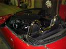 1990 Mazda Miata Roadster left rear top view with the top down