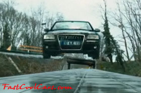Transporter 3, with one fast cool Audi car. Jumping a car from one railroad boxcar to another. cool.