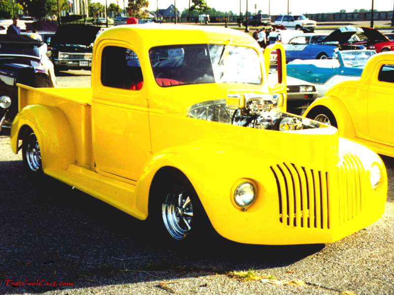 Show Truck, nice yellow paint, check out the engine.
