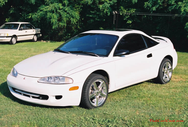 1996 Mitsubishi Eclipse (My wife Heather is the proud owner.) custom 17' polished aluminum wheels, with performance tires, tinted windows, killer sound system, she is just as sexy as the car.