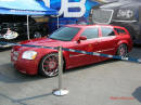 Nopi Nationals - Motorsports Supershow 2005, DUB custom Chrysler, huge chrome rims, budwieser fast cool car.