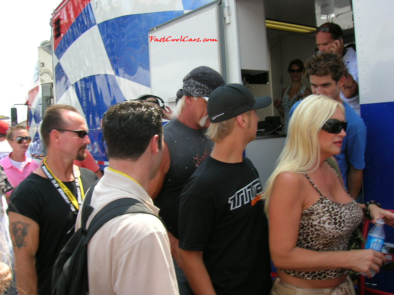 Hulk Hogan, his wife Linda, and their son Nick leaving the rear of the Foose trailer to go make announcements.