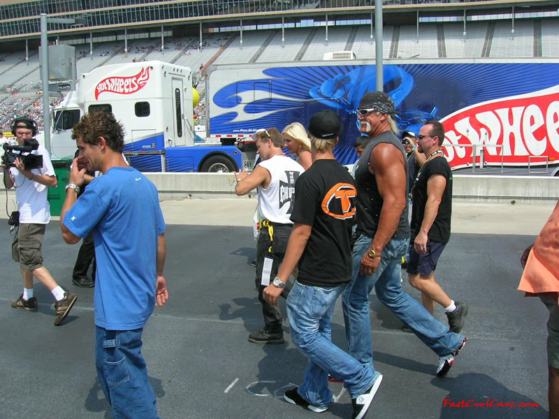 Hulk Hogan, his wife Linda, and their son Nick on there way to the main stage to make announcements.