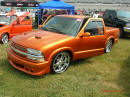 Nopi Nationals - Motorsports Supershow 2005, low rider truck with many body modifications, and cool hood, nice color.