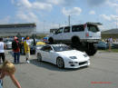 Nopi Nationals - Motorsports Supershow 2005, big truck towers over the little import.