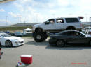 Nopi Nationals - Motorsports Supershow 2005, big truck towers over the little import.