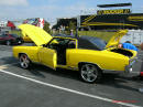 Nopi Nationals - Motorsports Supershow 2005, classic Chevrolet Monte Carlo, in awesome yellow and big chrome wheels.