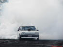 1983 Ford Falcon right hand drive with huge engine sticking out of the hood, great burnout.