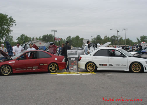 Lowriders that have been lowered, dropped, slammed, and scraping.