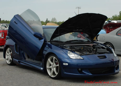 Lowriders that have been lowered, dropped, slammed, and scraping.