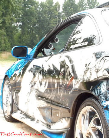 Lowriders that have been lowered, dropped, slammed, and scraping.