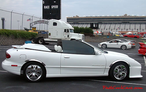 Lowriders that have been lowered, dropped, slammed, and scraping. Pontiac Sunfire low rider.