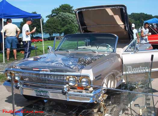 Lowriders that have been lowered, dropped, slammed, and scraping. American classic low rider car.