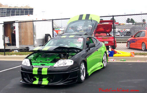 Lowriders that have been lowered, dropped, slammed, and scraping.