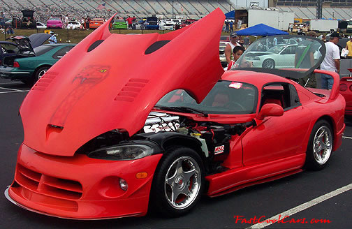 Lowriders that have been lowered, dropped, slammed, and scraping. Dodge Viper.